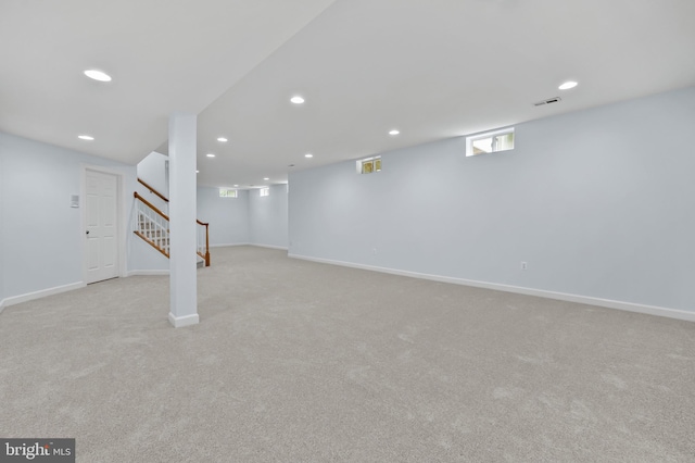 13017 English Turn Dr, Silver Spring, MD 20904 - basement featuring light colored carpet, recessed lighting, baseboards, visible vents, and stairway