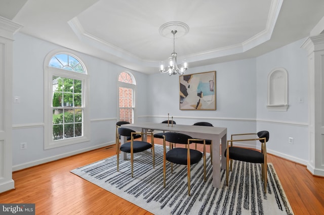 13017 English Turn Dr, Silver Spring, MD 20904 - dining area featuring crown molding, hardwood / wood-style flooring, a notable chandelier, and a raised ceiling