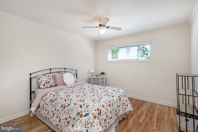 5511 Gwyn Pl, Alexandria, VA 22312 - bedroom with wood finished floors, baseboards, crown molding, and ceiling fan