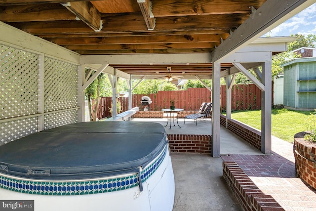 5511 Gwyn Pl, Alexandria, VA 22312 - view of patio with a fenced backyard, grilling area, and a hot tub