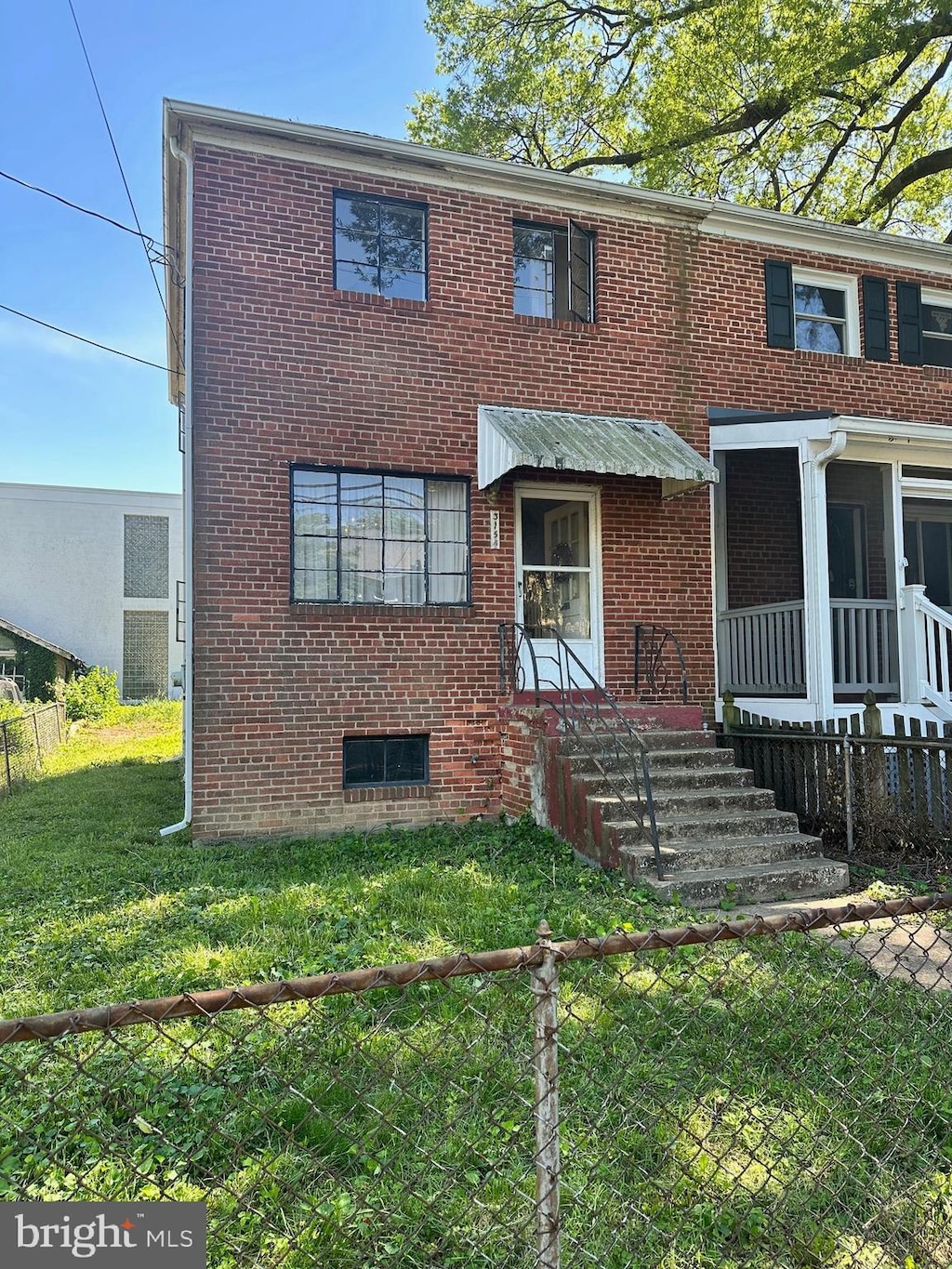315 E Raymond Ave Unit A, Alexandria, VA 22301 - view of front of home with brick siding and entry steps