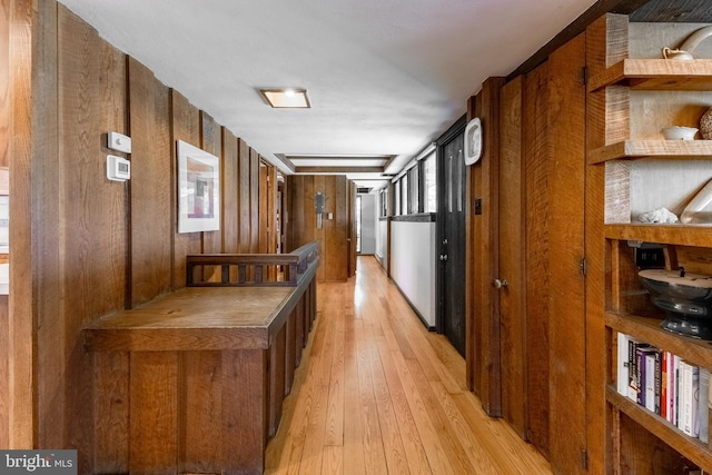 715 W Park Ave, State College, PA 16803 - hall with light wood-type flooring and wood walls