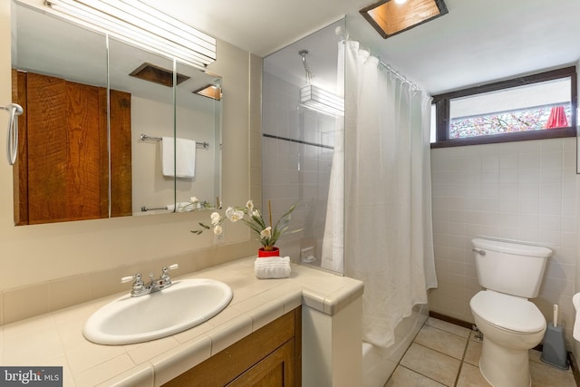 715 W Park Ave, State College, PA 16803 - full bathroom featuring shower / bath combination with curtain, toilet, vanity, and tile patterned floors