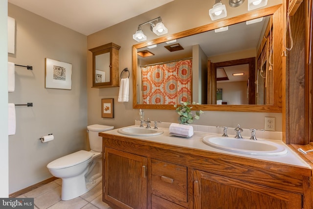 715 W Park Ave, State College, PA 16803 - bathroom featuring toilet, tile patterned flooring, a sink, and double vanity