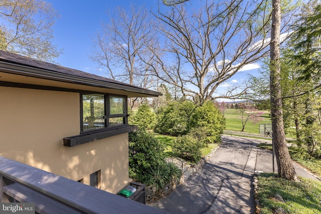 715 W Park Ave, State College, PA 16803 - view of home's exterior featuring stucco siding
