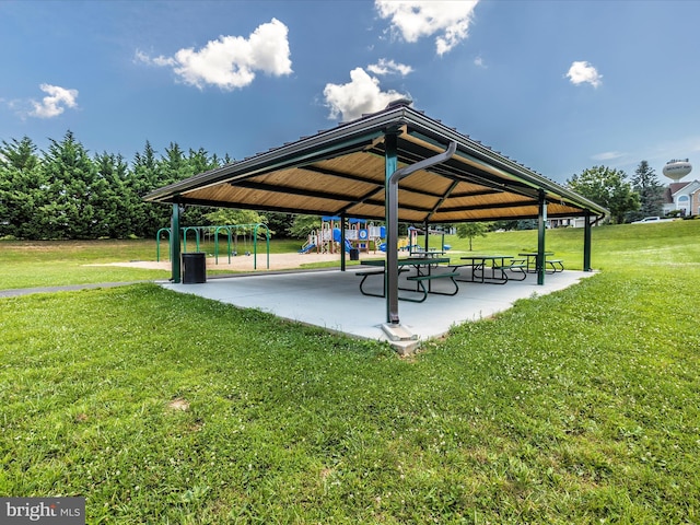 view of home's community with a lawn, playground community, and a gazebo