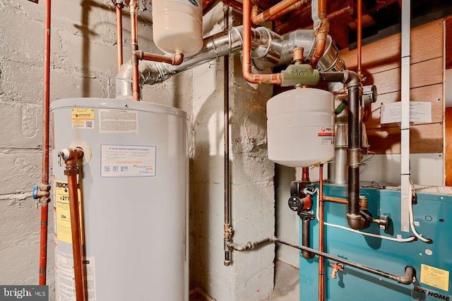 utilities featuring gas water heater and a heating unit