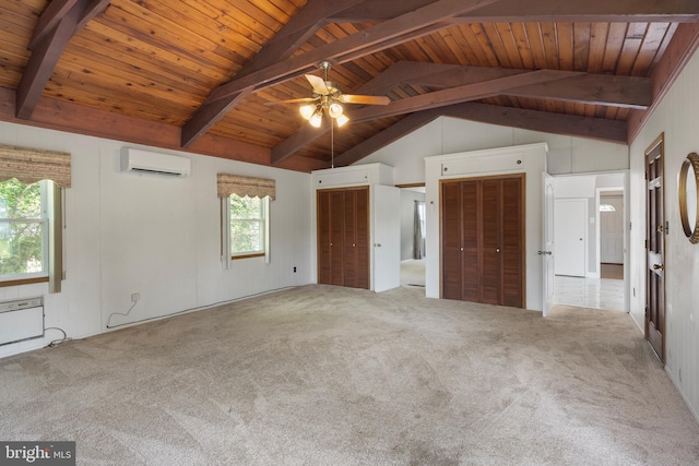 unfurnished bedroom featuring multiple closets, wood ceiling, and an AC wall unit