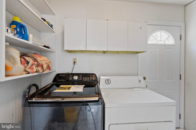 laundry room with independent washer and dryer