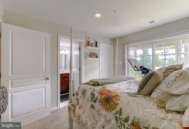 carpeted bedroom with ensuite bathroom, visible vents, baseboards, access to outside, and recessed lighting