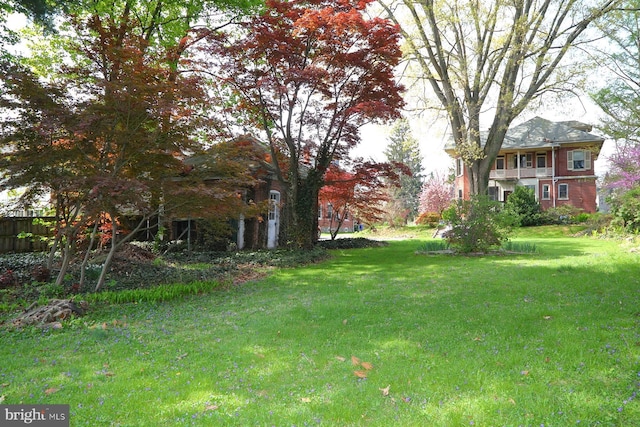 view of yard with fence