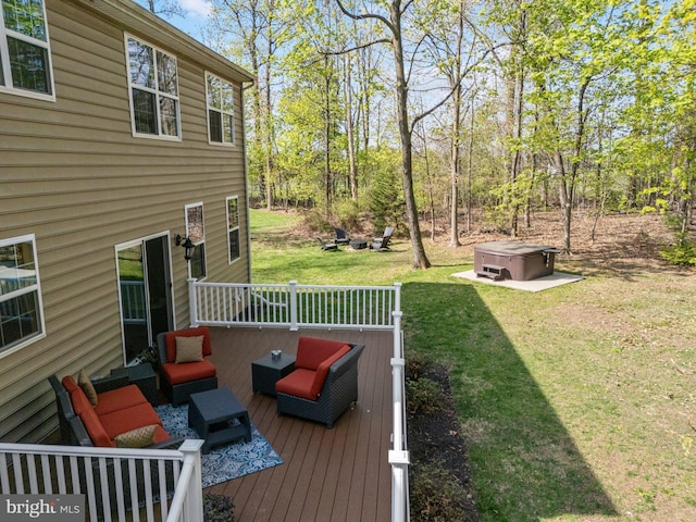 view of yard featuring an outdoor living space, a hot tub, and a wooden deck
