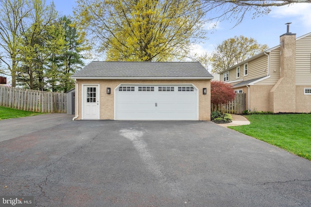 detached garage with fence