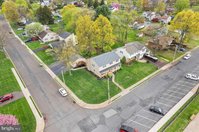 birds eye view of property with a residential view