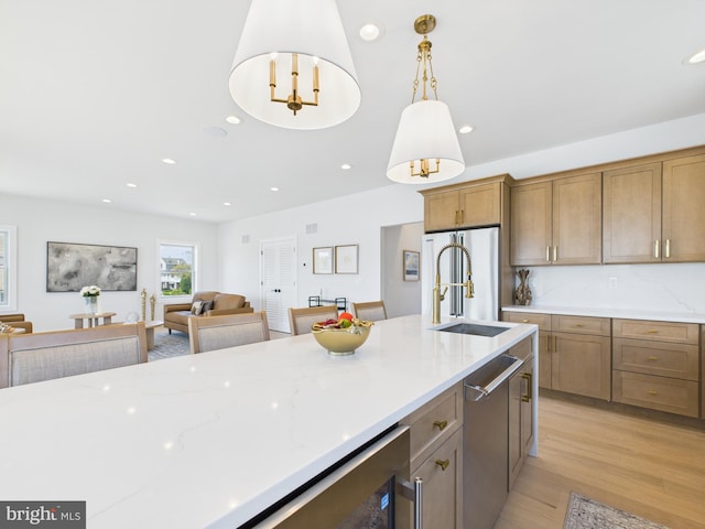 29 Bay Way, Brick, NJ 08723 - kitchen featuring recessed lighting, stainless steel dishwasher, hanging light fixtures, light wood-style floors, and a sink