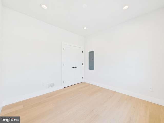 29 Bay Way, Brick, NJ 08723 - unfurnished room with wood finished floors, visible vents, electric panel, and baseboards