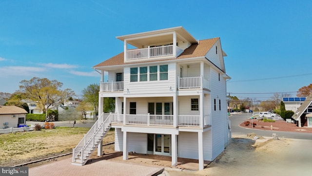 29 Bay Way, Brick, NJ 08723 - rear view of house with roof with shingles, a balcony, and stairway