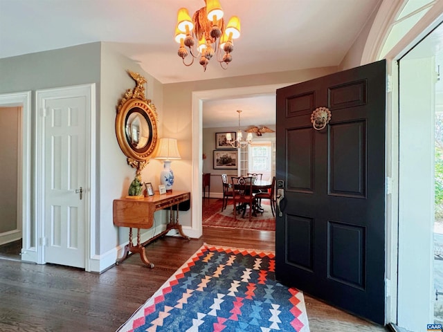 1012 Locust Ave, Charlottesville, VA 22901 - entrance foyer with wood finished floors, baseboards, and a notable chandelier