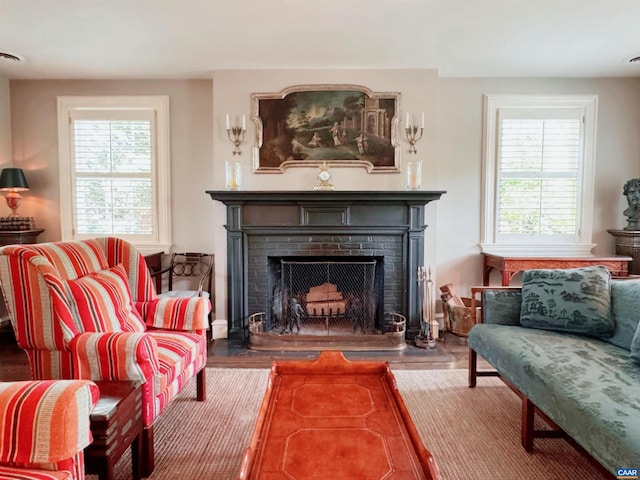 1012 Locust Ave, Charlottesville, VA 22901 - living area featuring a fireplace and wood finished floors