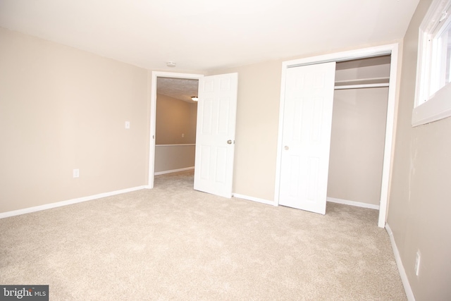 415 Sheppard Ave, Runnemede, NJ 08078 - unfurnished bedroom with light colored carpet, a closet, and baseboards