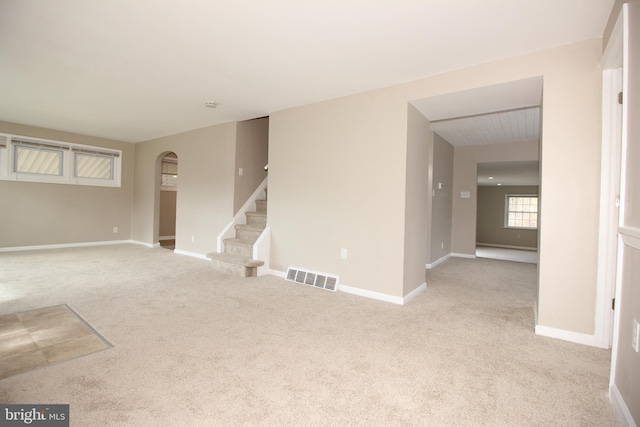 415 Sheppard Ave, Runnemede, NJ 08078 - carpeted spare room featuring arched walkways, stairway, and baseboards