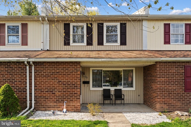 197 Crocus Ct, Quakertown, PA 18951 - view of front of house featuring brick siding and a shingled roof