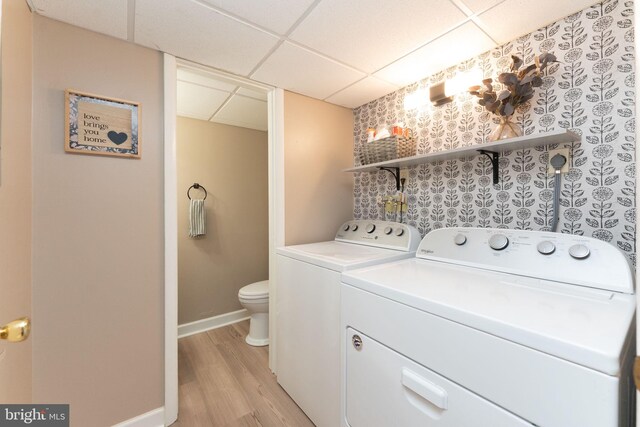 197 Crocus Ct, Quakertown, PA 18951 - laundry room with baseboards, laundry area, light wood finished floors, and washing machine and clothes dryer