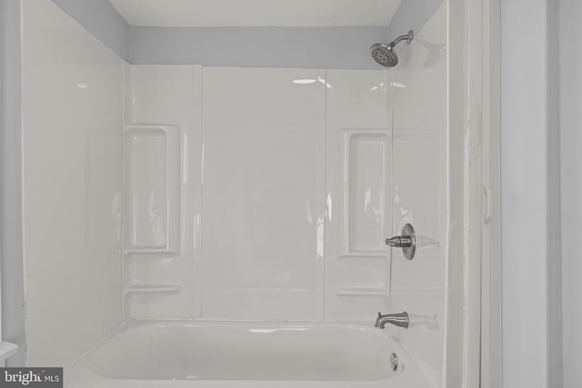 full bathroom featuring a shower and a bathtub