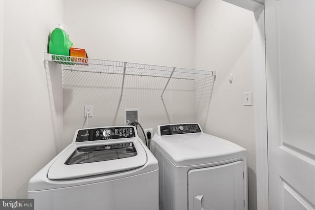 laundry room featuring laundry area and washing machine and dryer