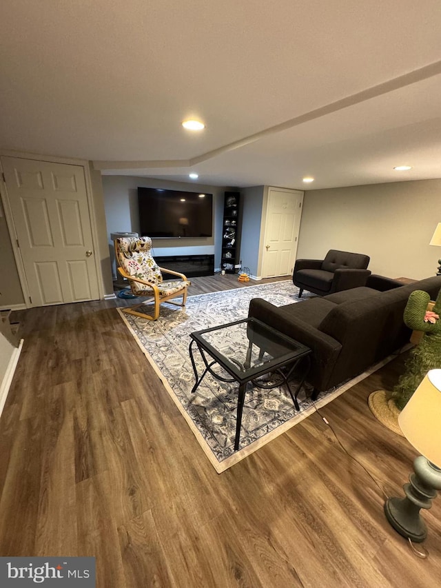 living area featuring recessed lighting and wood finished floors