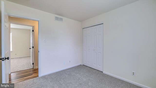 641 Cypress, Vineland, NJ 08360 - unfurnished bedroom with baseboards, carpet flooring, visible vents, and a closet