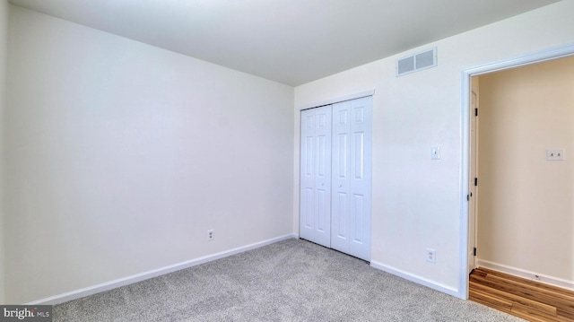 641 Cypress, Vineland, NJ 08360 - unfurnished bedroom featuring a closet, carpet, visible vents, and baseboards