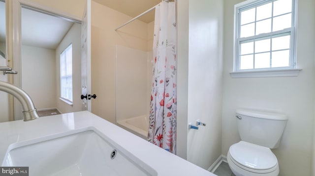 641 Cypress, Vineland, NJ 08360 - bathroom featuring vanity, a wealth of natural light, a shower with shower curtain, and toilet