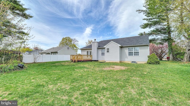 641 Cypress, Vineland, NJ 08360 - back of property featuring a lawn, a chimney, fence, and a deck