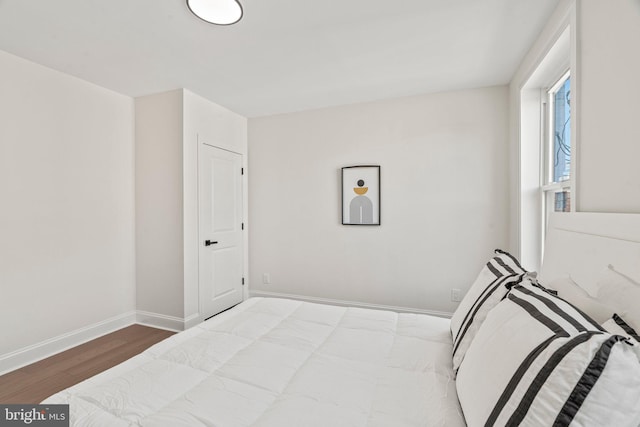 1102 Mercy St, Philadelphia, PA 19148 - unfurnished bedroom featuring wood finished floors and baseboards
