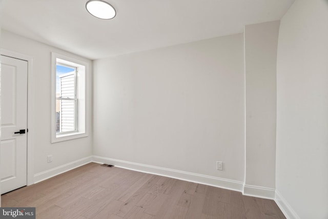 1102 Mercy St, Philadelphia, PA 19148 - empty room with visible vents, baseboards, and wood finished floors