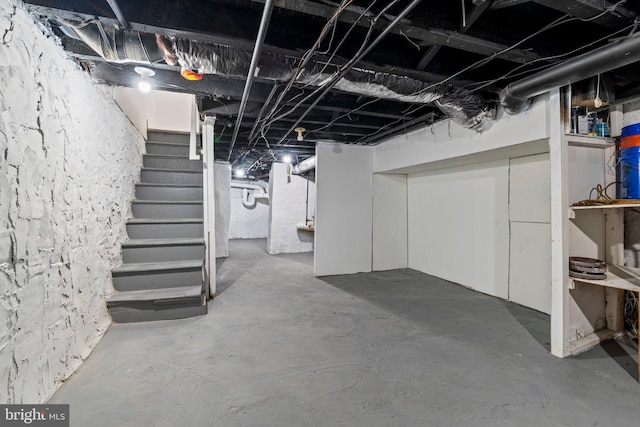 1102 Mercy St, Philadelphia, PA 19148 - unfinished basement featuring stairway