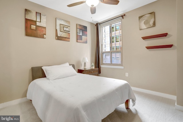 888 N Quincy St Unit 407, Arlington, VA 22203 - bedroom with carpet flooring, baseboards, and ceiling fan