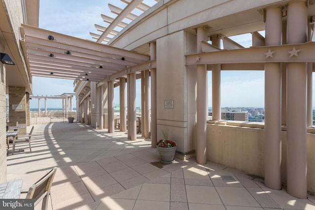 888 N Quincy St Unit 407, Arlington, VA 22203 - view of patio / terrace featuring a pergola and a water view