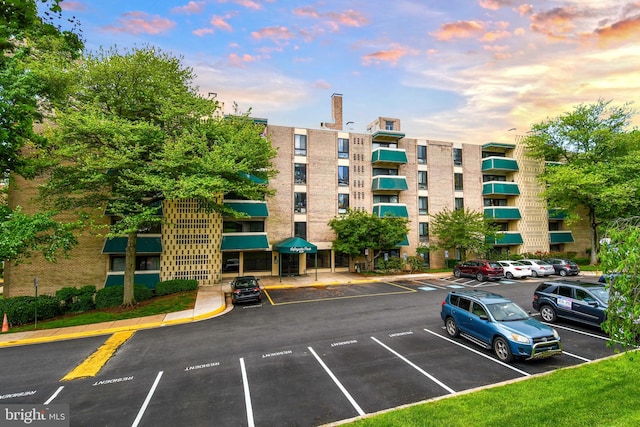 6137 Leesburg Pike Unit 101, Falls Church, VA 22041 - view of apartment building / complex featuring uncovered parking