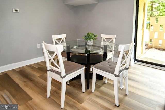 6137 Leesburg Pike Unit 101, Falls Church, VA 22041 - dining space featuring wood finished floors and baseboards
