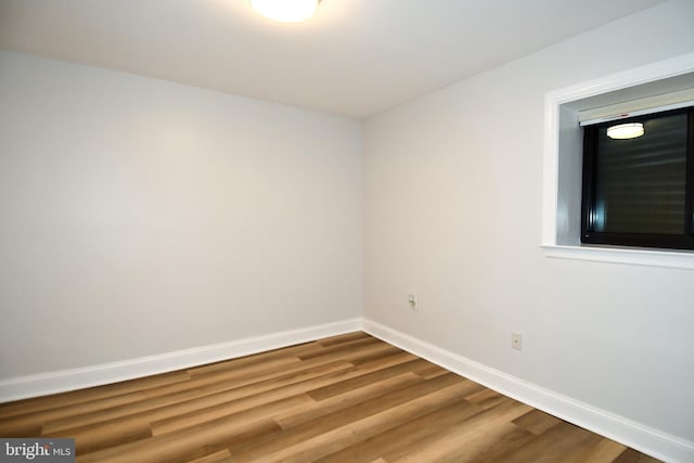 6137 Leesburg Pike Unit 101, Falls Church, VA 22041 - empty room featuring wood finished floors and baseboards