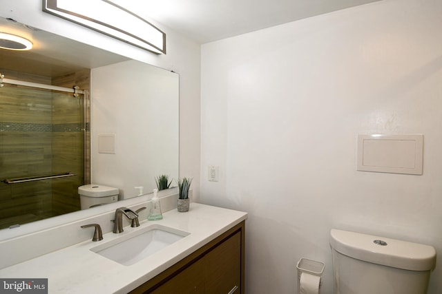 6137 Leesburg Pike Unit 101, Falls Church, VA 22041 - bathroom featuring toilet, a shower stall, and vanity