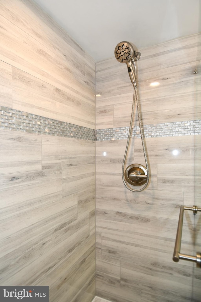 6137 Leesburg Pike Unit 101, Falls Church, VA 22041 - bathroom with a tile shower