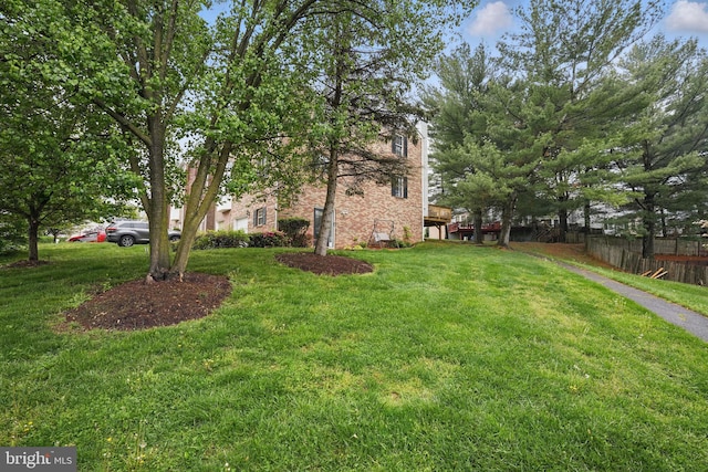 view of yard featuring fence