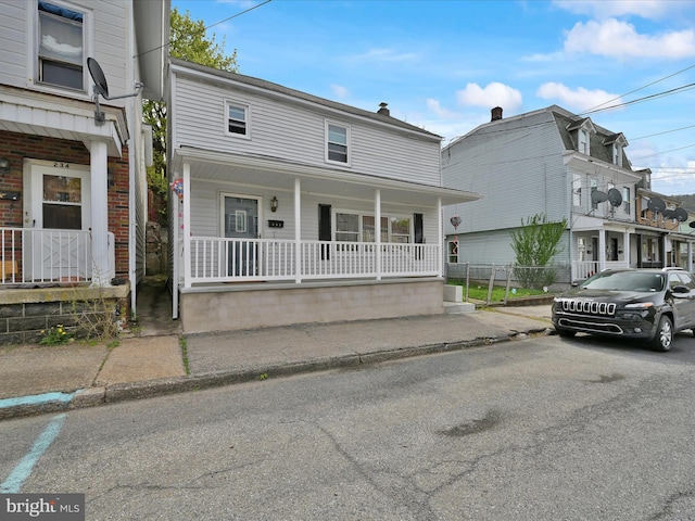 232 N Coal St, Port Carbon, PA 17965 - view of front of property featuring covered porch and fence
