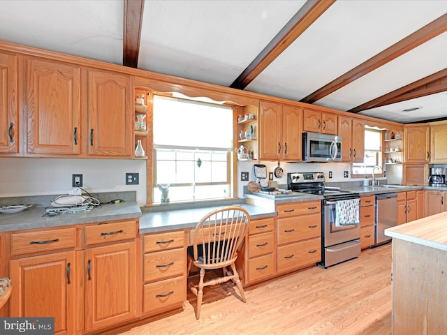 kitchen with beamed ceiling, appliances with stainless steel finishes, open shelves, and light wood finished floors