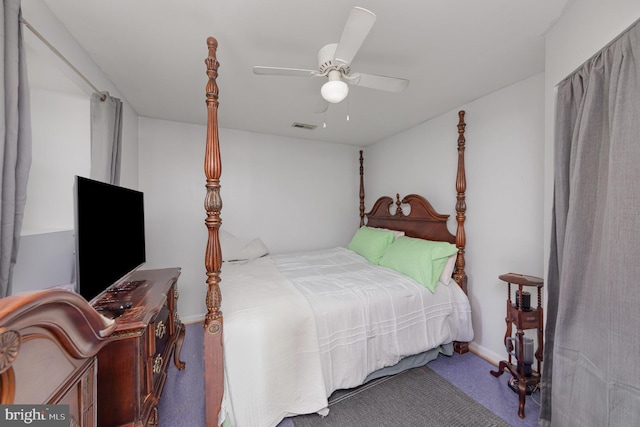 bedroom with visible vents, a ceiling fan, and baseboards
