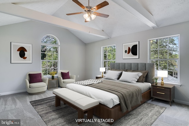 bedroom with baseboards, lofted ceiling with beams, carpet floors, and multiple windows