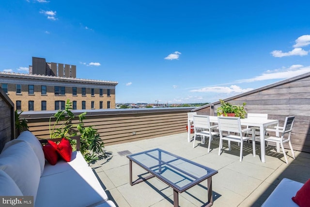 view of patio / terrace featuring an outdoor hangout area and outdoor dining area